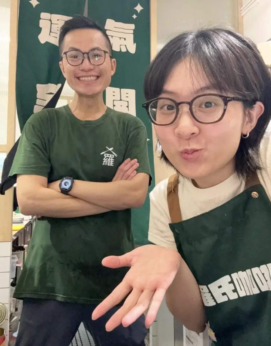 Lo's Taiwan staff selfie in branded green uniform
