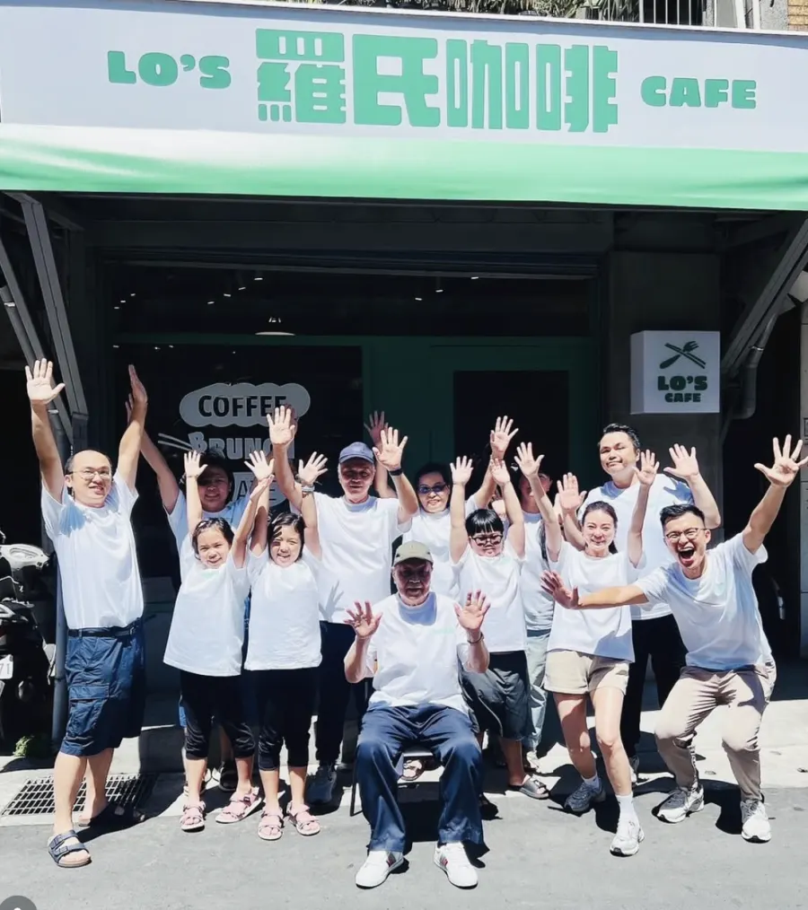 The Lo's Taiwan team gathered outside the cafe storefront